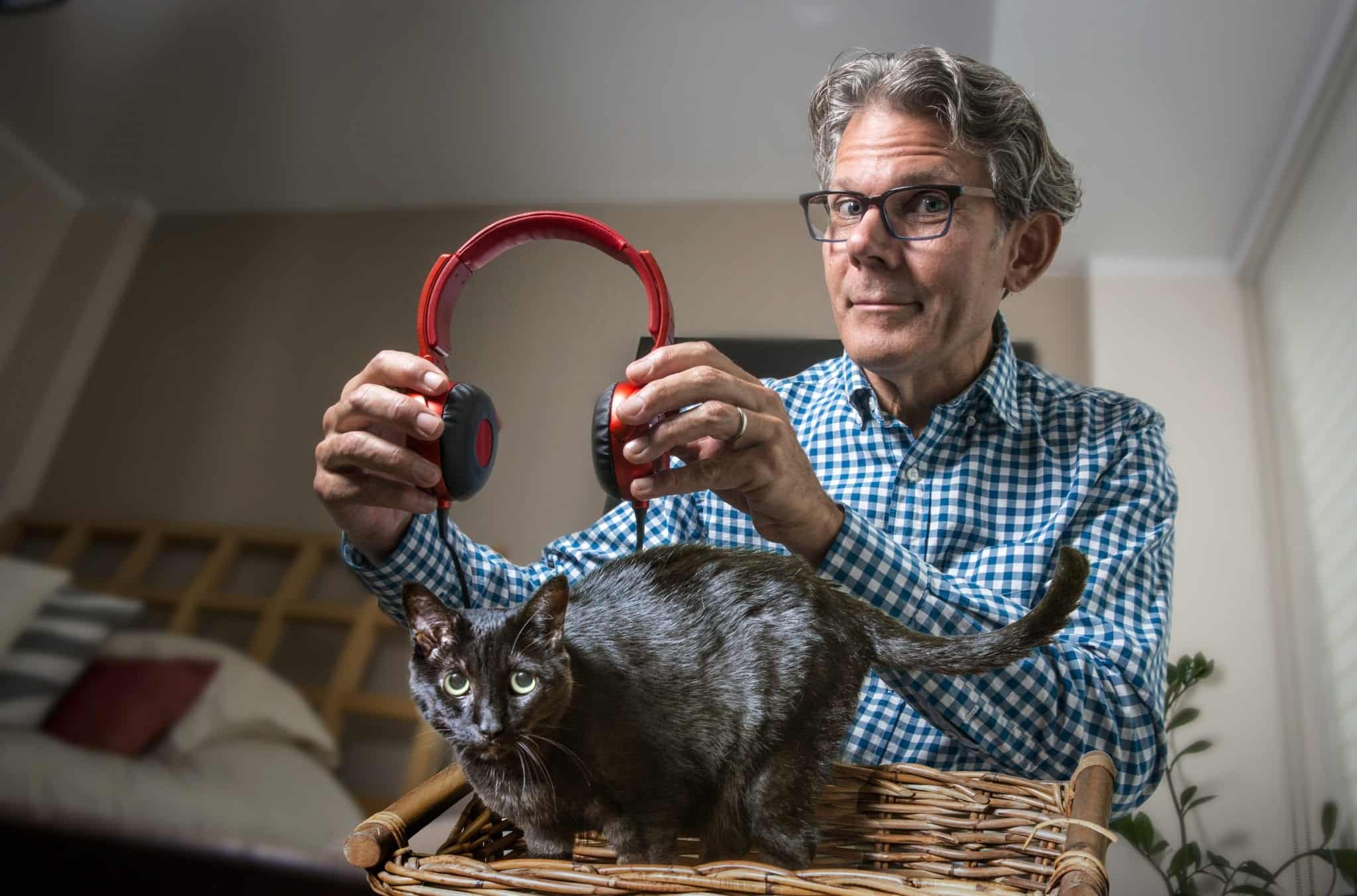 BETHESDA, MD - SEPTEMBER 25: Composite photo of David Teie, who is composing music for cats, in his apartment on September, 25, 2015 in Bethesda, MD. (Photo by Bill O'Leary/The Washington Post)