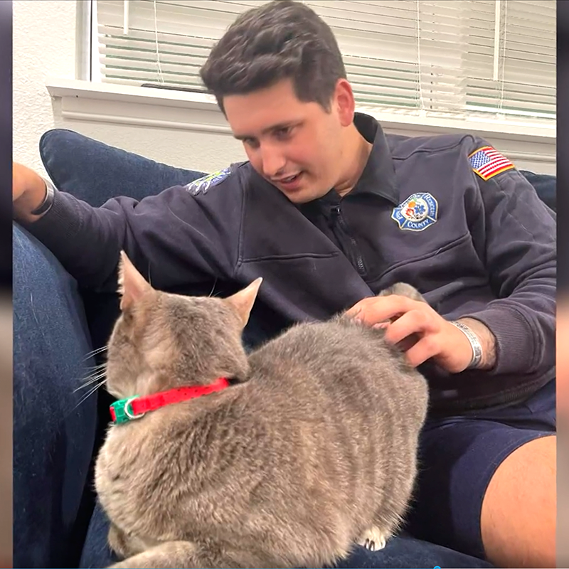 Firefighter Brett Maneri Adopts Mia the Cat