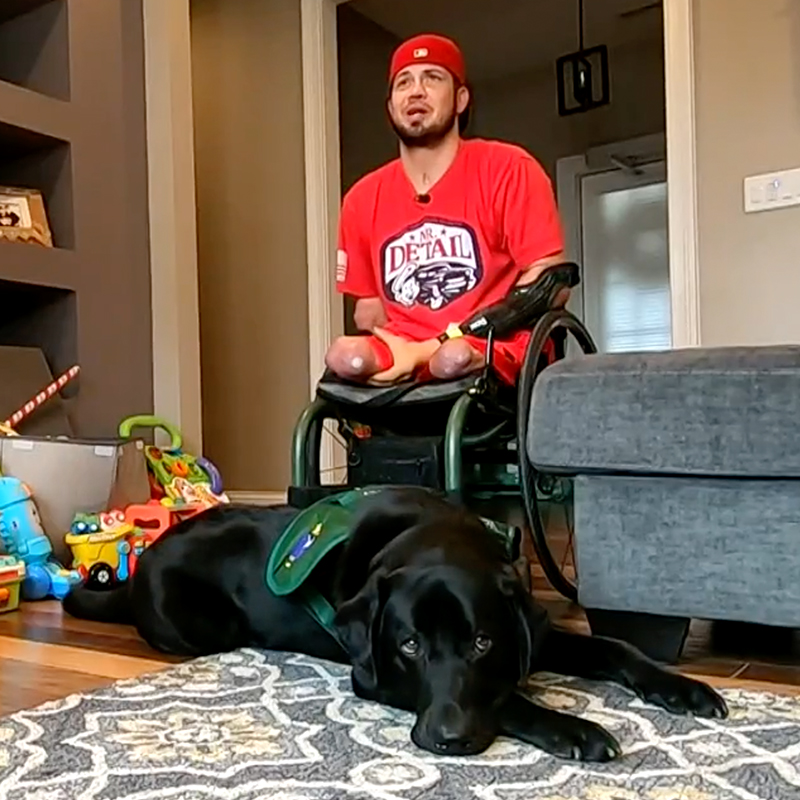 Todd Nicely with service dog