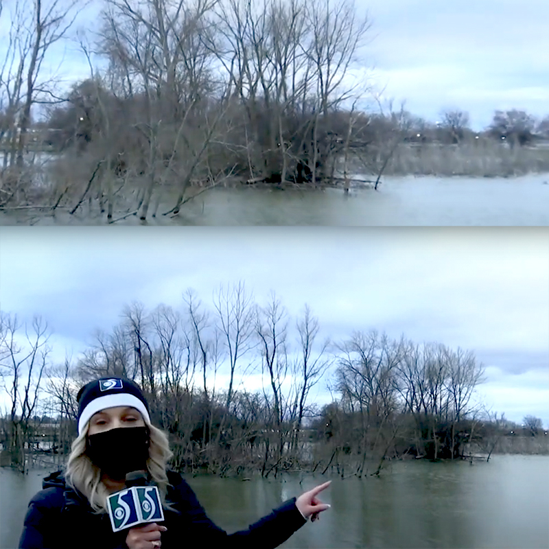 WNEM reporter points to the island in the Saginaw River