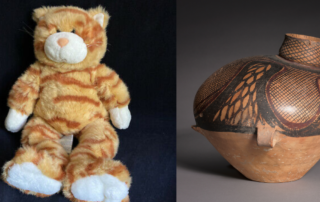 orange tabby stuffed cat and urn