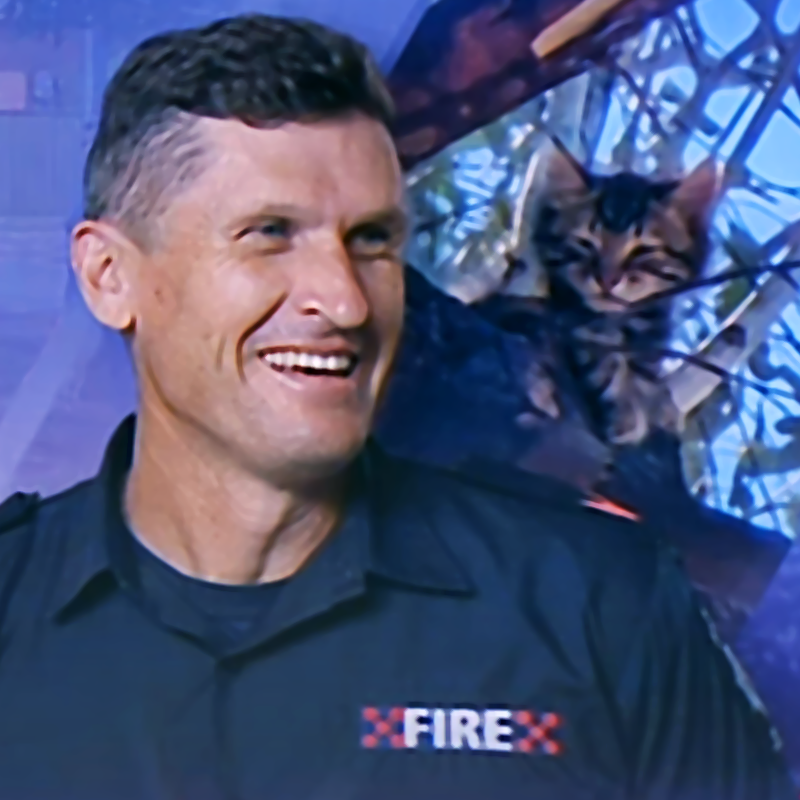 Australian Firefighter Matthew Hodder with tree kitten