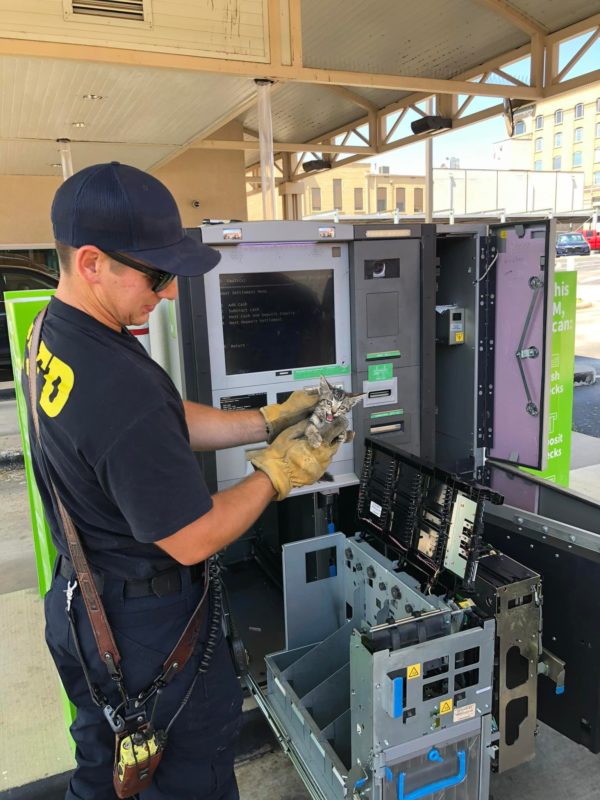 Cash with firefighters in ATM