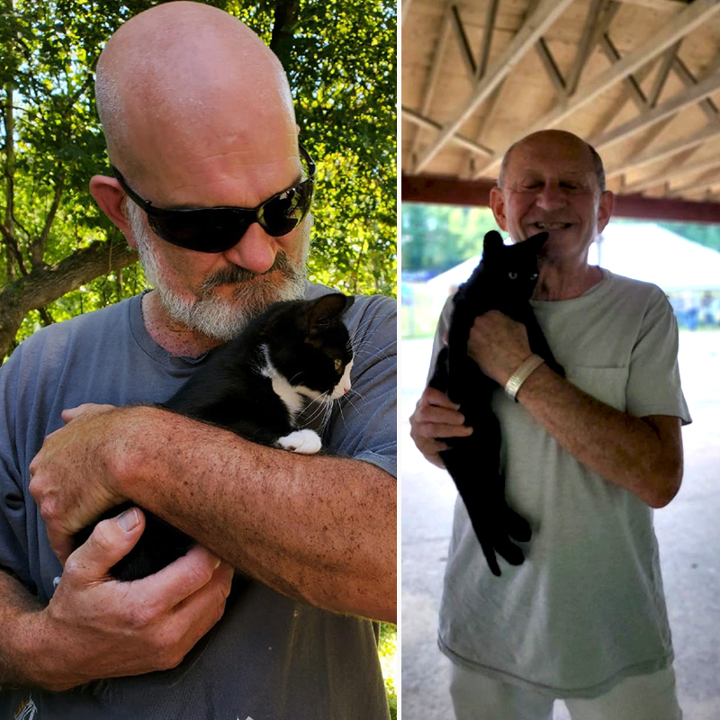 Men adopting black cat