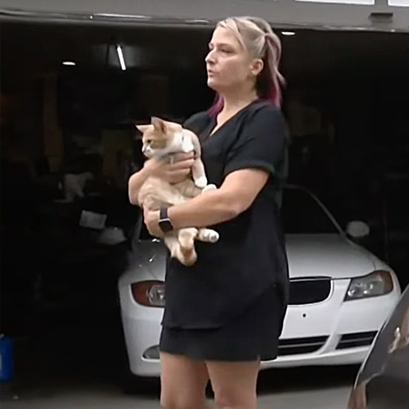 Heidi Stamper with Thor near garage, carbon monoxide