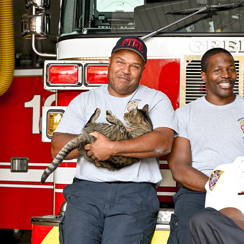 Greensboro Fire Department with adopted cat