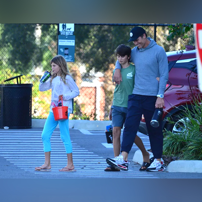 Tom Brady and his kids walking from the Tampa Bay Humane Society on Halloween