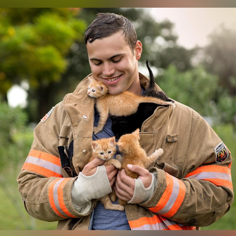 Firefighter Matthew Roos poses with bottle baby kittens for calendar, Furry Nation Salvation.