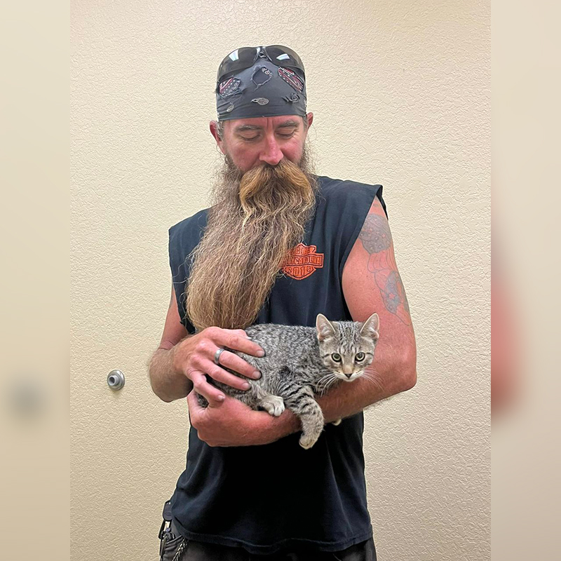 Sparky's new 'cat dad'
