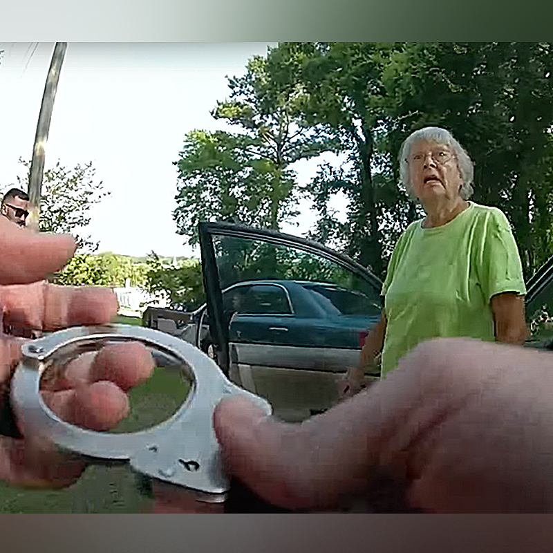 Officer gets out the handcuffs for Beverly Roberts, 85 for helping feral cats while charged with trespassing