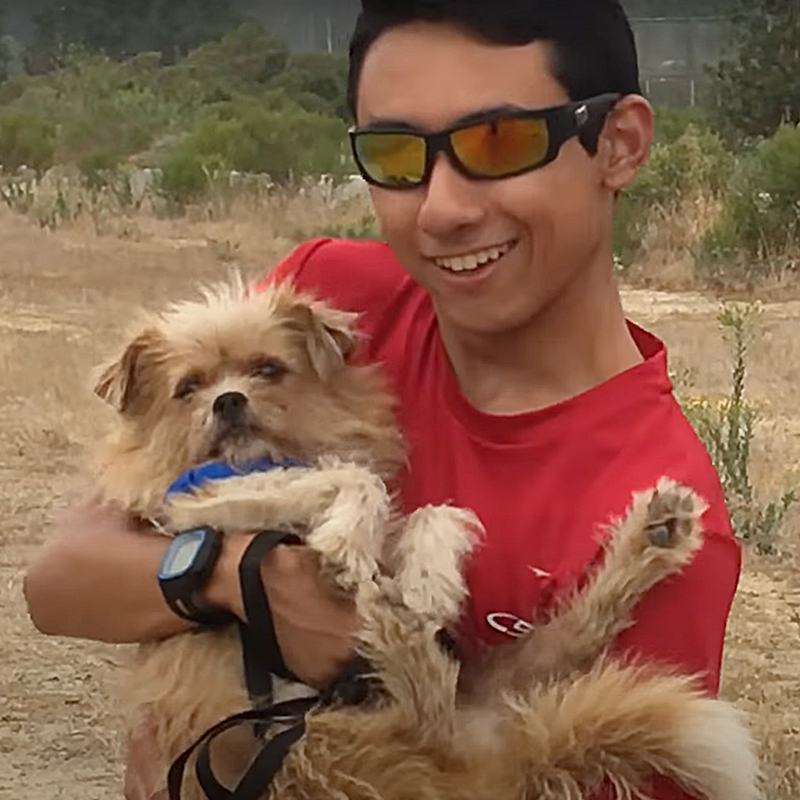 cross country runner Joshua Menusa adopted Fred, the shelter dog