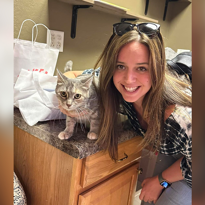 Woman adopts mama at Purrfect Cat Rescue Inc.