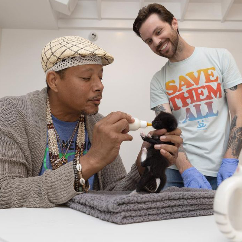 Terrence Howard bottle-feeding a foster kitten with Best Friends Animal Society in Los Angeles