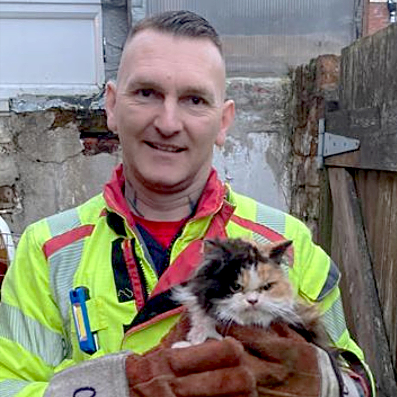 Lancashire Fire and Rescue Service, UK, Crew Manager Andy Friar, CM Friar, cat rescued between two walls looked grumpy about it, 5